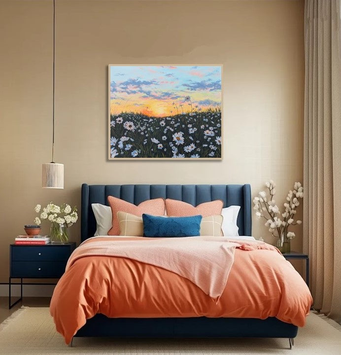 Large floral landscape painting in modern bedroom with wild daisies and sunset sky. By London artist Judy Century Art.
