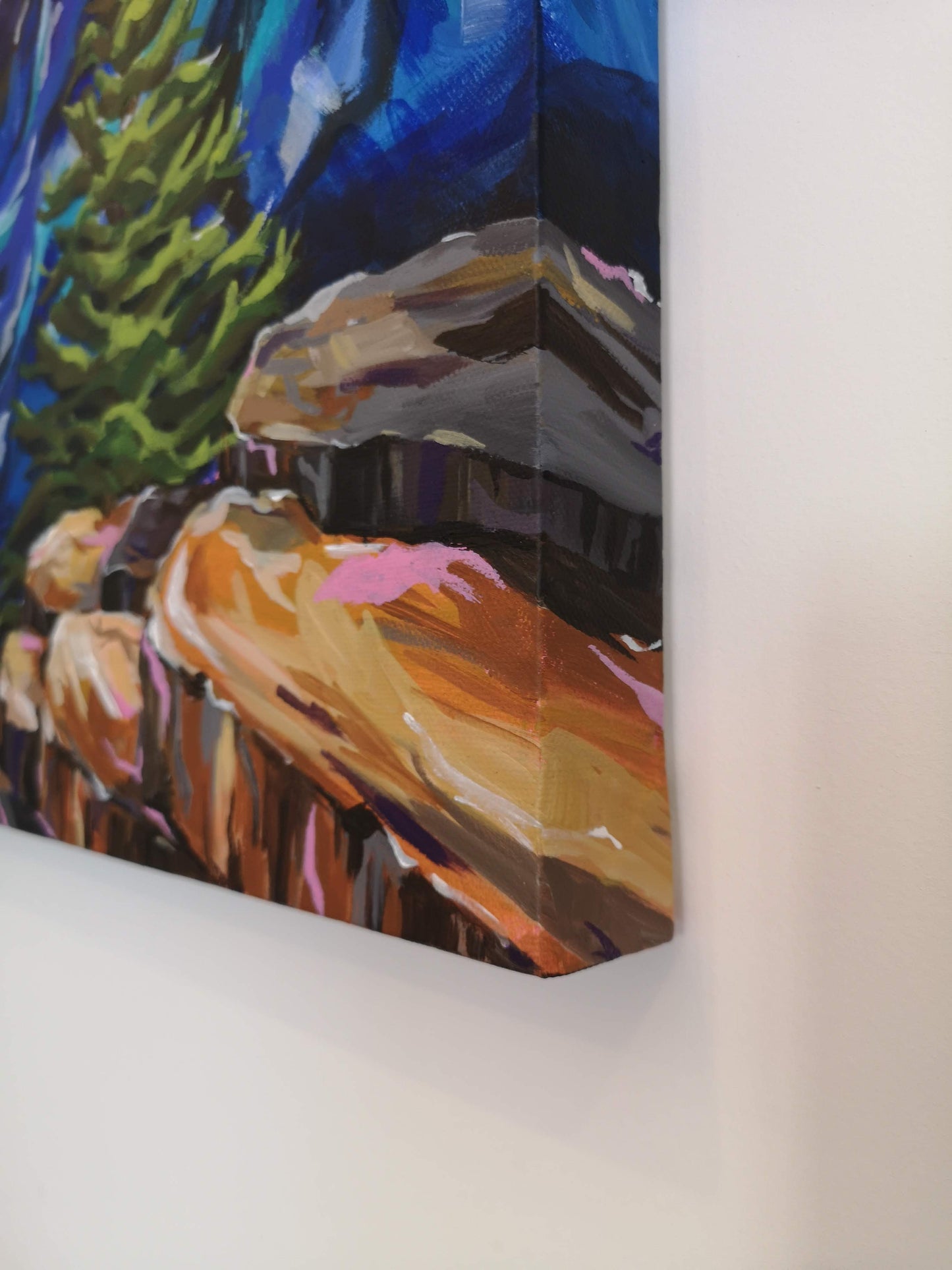 Side view of Vibrant, colourful Abstract Landscape painting by Judy Century showing painting wrapped around edges of box canvas.