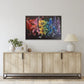 Rainbow flower painting on contrasting black background by Judy Century Art. Vibrant acrylic canvas hung on white wall above light wood side board with lamp and green eucalyptus leaves