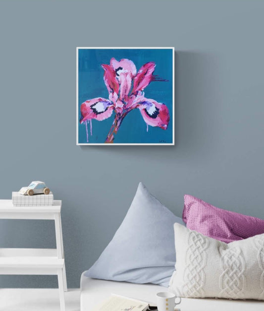 Bright Colourful Modern Iris flower canvas painting by Judy Century. Teal background with pink, white, purple and navy Lily. Original Art hanging in kids bedroom interior for home decor inspiration