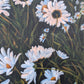 details of daisy flower from large landscape painting with sunset sky.