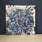Abstract Acrylic Painting Cornflower Blue Burst Square Canvas teal black grey white sky blue, flower, bloom, floral artwork, judy century shown against a navy wall