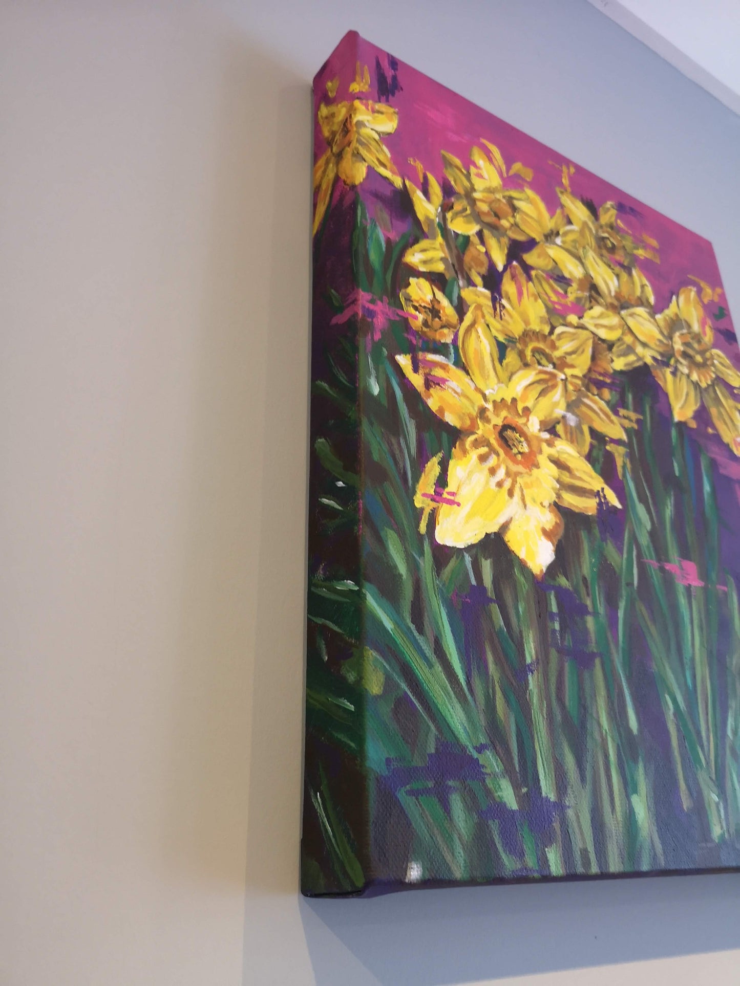 Image showing vibrant canvas painting of daffodil flowers wrapped around the edges of a deep edged cotton canvas by Judy Century artist