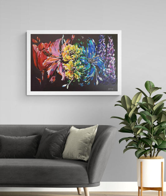 Rainbow Flower Painting and art print of big scale floral abstract images in many colours. Shown above slate grey sofa