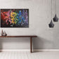 Rainbow flower painting on contrasting black background by Judy Century Art. Acrylic canvas pictured hung above minimalist dark wood side table with black pendant lights and concrete wall