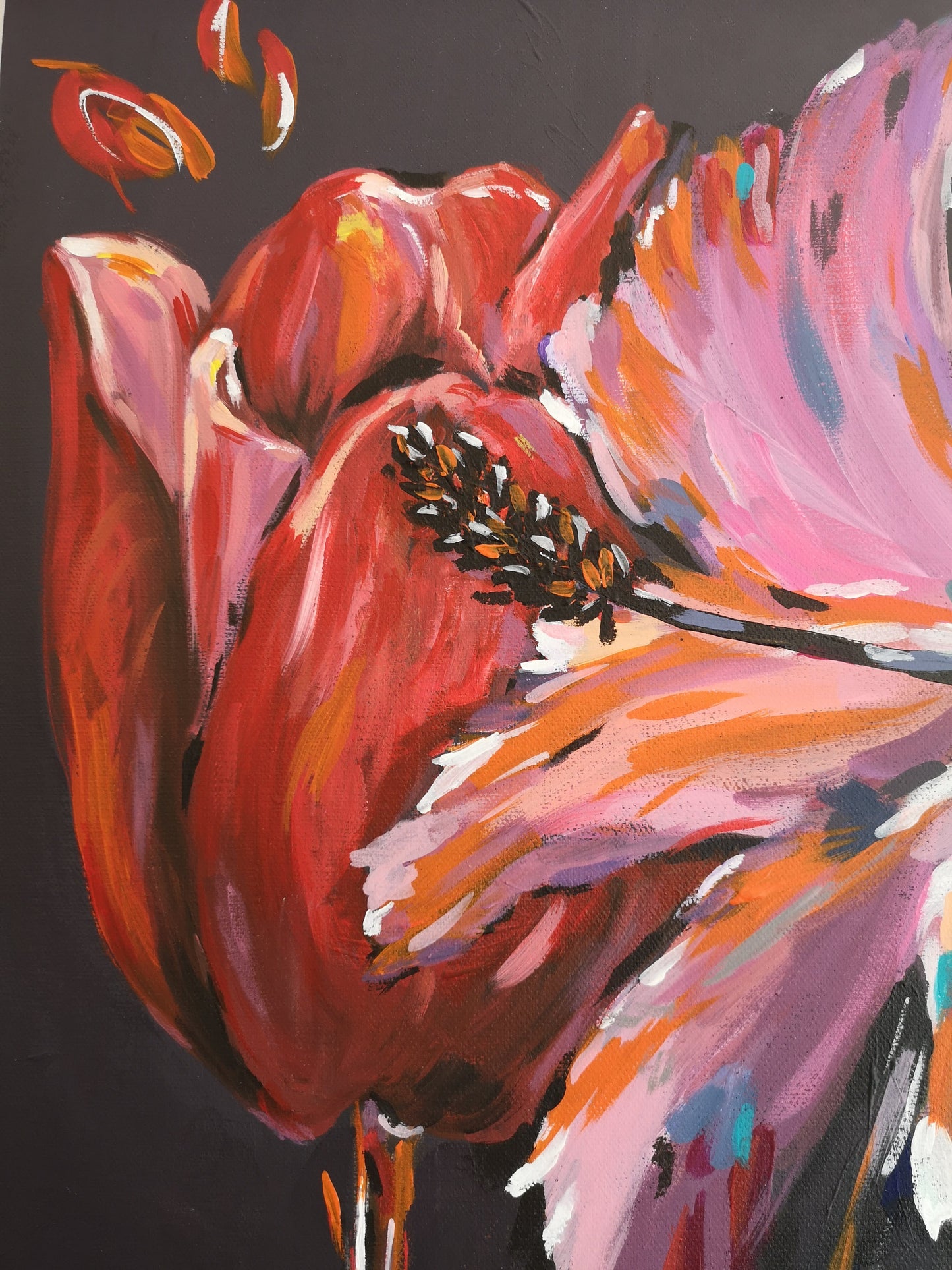 Close up of carnival rainbow flower painting showing close up of red tulip and pink and orange hibiscus flower