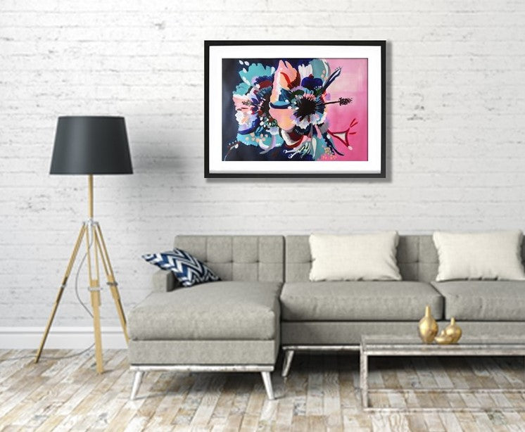 Art Print of original Hibiscus Flower abstract painting by Judy Century Art. Framed in Black above a grey couch