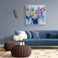 Original Abstract Floral Colourful Canvas Painting in modern living room with navy couch and grey walls,  'Breaking Free' Judy Century 80x80cm