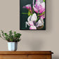 Modern botanical small canvas painting magnolia tree by Judy Century shown hallway with wooden chest drawers and plant