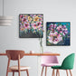 A pair of colourful abstract floral original paintings by Judy Century. Hanging in a contemporary dining room interior.