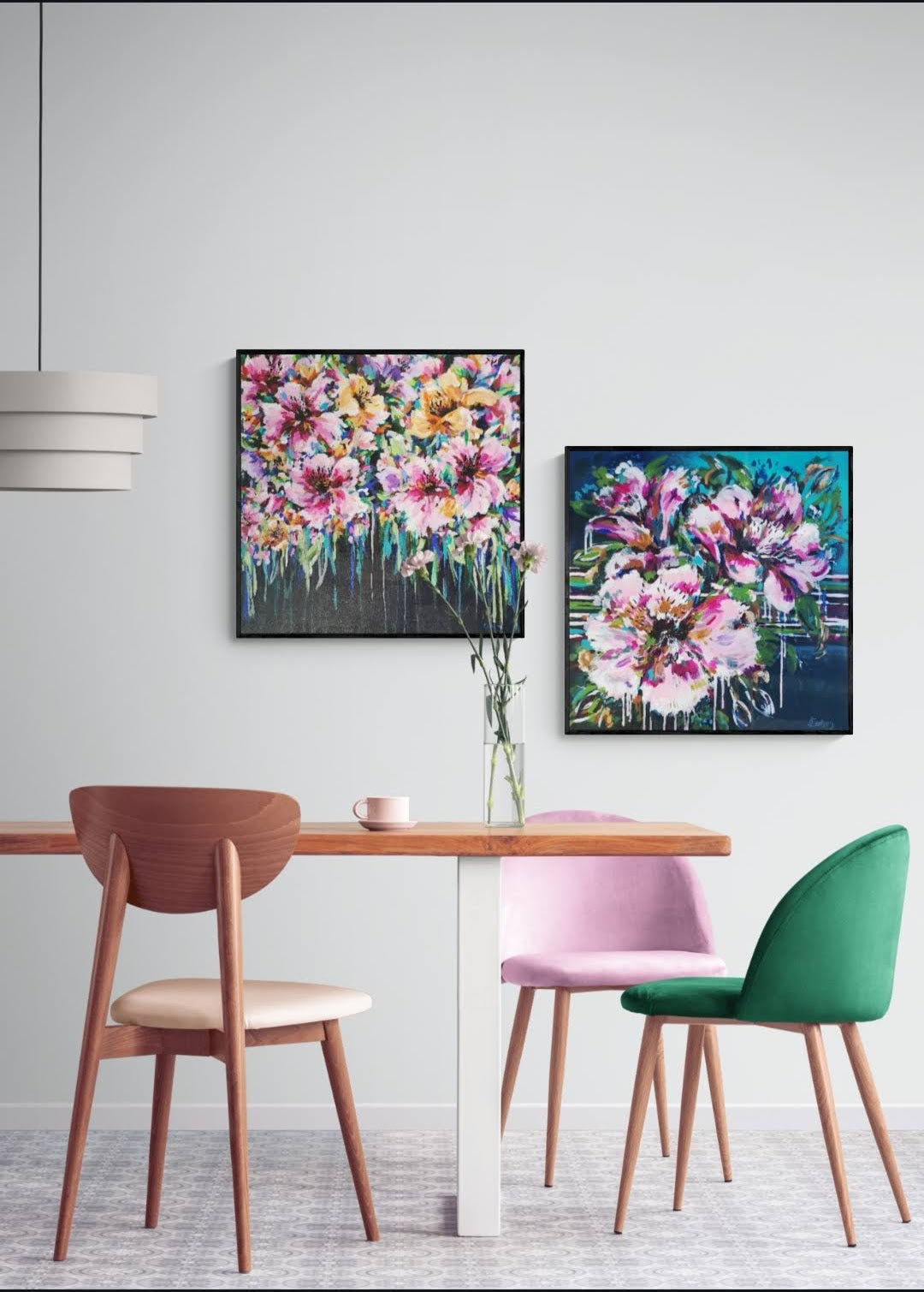 A pair of colourful abstract floral original paintings by Judy Century. Hanging in a contemporary dining room interior.